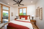 The master bedroom has a king size bed and direct access to the north balcony, facing Whitefish Mountain Resort.